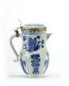 A Chinese blue and white moulded jug with European silver mounts