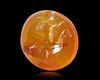 A ROMAN CARNELIAN INTAGLIO SHOWING AN EROS RIDING A GOOSE, 1ST CENTURY AD