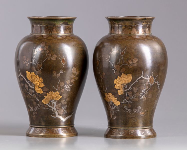 A pair of Japanese bronze vases