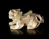 A WHITE JADE CARVING OF PIXIE, CHINA, HAN DYNASTY (206 BC-220 AD)