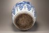 A massive blue and white jar