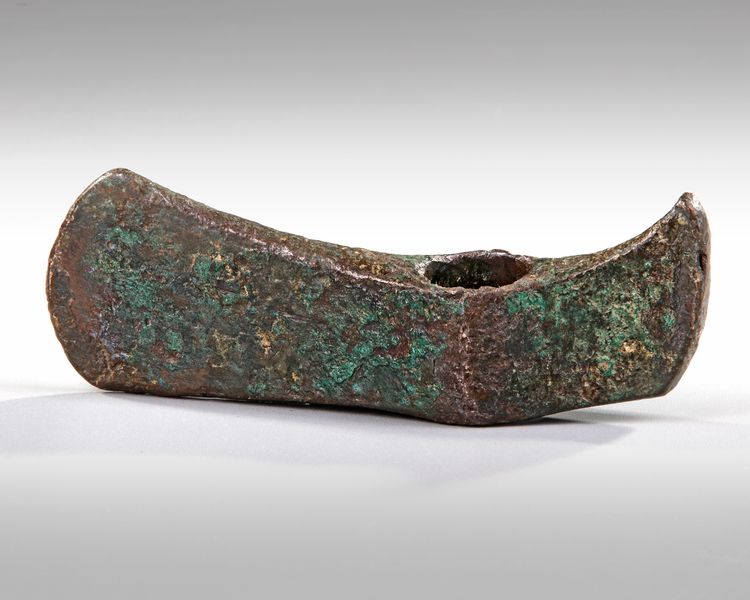 A BRONZE SOCKET AXE, LATE BRONZE AGE, 1300 - 800 BC