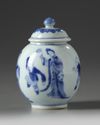 A small Chinese blue and white jar and a cover