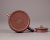 A Chinese yixing teapot and cover