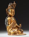 A  Chinese gilt-bronze figure of Avalokitesvara