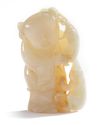 A Chinese pale cream jade 'boy and monkey' group