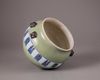 A Chinese celadon-ground blue and white jar