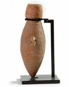 A CHINESE YANGSHAO POTTERY 'CORD MARKED' AMPHORA, SOUTH SHAANXI, CIRCA 4800-3600 BC