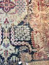 A LARGE RAVER KIRMAN RUG, SOUTH-PERSIA
