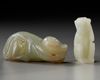 TWO CHINESE CELADON AND PALE CELADON JADE MONKEYS, 20TH CENTURY