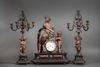 A FRENCH CLOCK AND A PAIR OF CANDELABRAS, NAPOLEON III STYLE, SIGNED BOULANGER SOISSON