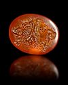 A ROMAN CARNELIAN INTAGLIO OF A GRYLLOS, 1ST CENTURY AD