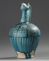 A LARGE RAQQA UNDERGLAZE PAINTED POTTERY EWER, SYRIA, 12TH-13TH CENTURY