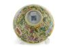 A Chinese yellow-ground famille-rose bowl