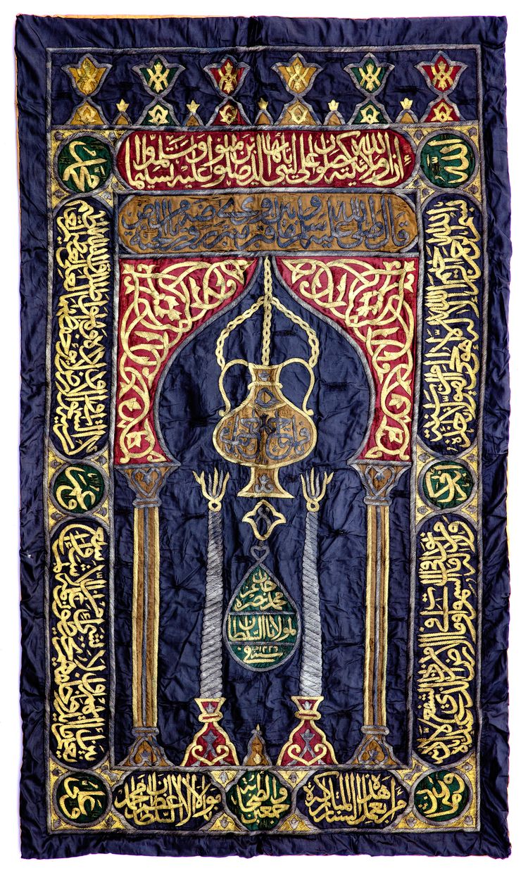 AN OTTOMAN METAL THREAD EMBROIDERED CURTAIN WITH THE TUGHRA OF MEHMED V AND DATED 1336 AH/1917 AD