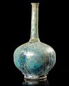 A KASHAN TURQUOISE GLAZED BOTTLE CENTRAL PERSIA, CIRCA 1200