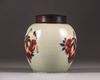 A Chinese celadon-ground 'nine peaches' ovoid jar