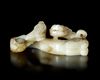 A WHITE JADE DRAGON/PHOENIX PENDANT, CHINA, HAN DYNASTY (206 BC-220 AD)