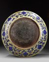 A massive Chinese yellow-glazed blue and white dragon charger