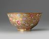 A Chinese gilt-ground famille rose bowl