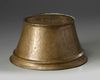 A brass Mamluk candle base