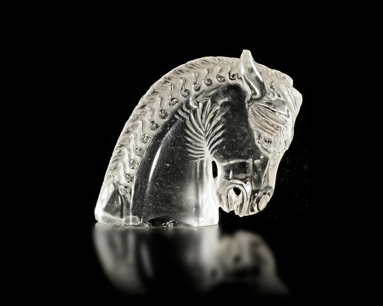 AN INDIAN ROCK CRYSTAL HORSE-HEAD CARVING, 18TH CENTURY