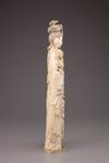 An ivory figure of a standing lady