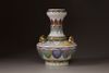 A polychrome porcelain vase