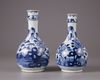 A pair of Chinese blue and white ‘peony’ bottle vase