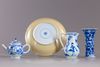 A group of four blue and white objects