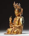 A  Chinese gilt-bronze figure of Avalokitesvara