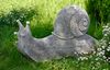 A VERY LARGE LIMESTONE SCULPTED MODEL OF A GARDEN SNAIL, LATE 20TH CENTURY