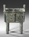 A CHINESE ARCHAIC BRONZE RECTANGULAR FOOD VESSEL, SHANG DYNASTY (CIRCA 1600-1100 BC)