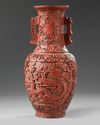 A Chinese carved cinnabar lacquer vase
