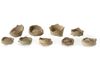 A GROUP OF NINE FATIMID UNGLAZED POTTERY WATER FILTERS, EGYPT, 10TH -11TH CENTURY
