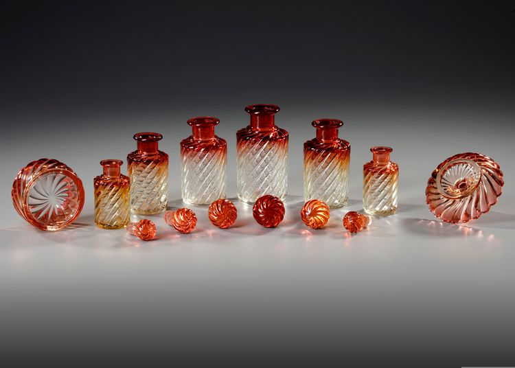 A TOILETSET OF CRANBERRY BACCARAT, CIRCA 1880