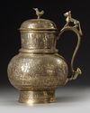 A PERSIAN SILVER INLAID COVERED BRONZE JUG, KHURASAN STYLE, 19TH CENTURY