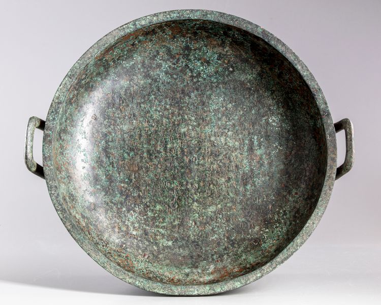 A CHINESE  BRONZE RITUAL WATER VESSEL, PAN, ZHOU STYLE
