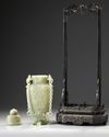A Chinese pale celadon jade vase and cover