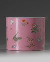 A Chinese pink-ground sgraffiato famille rose 'butterflies and flowers' brush pot, bitong