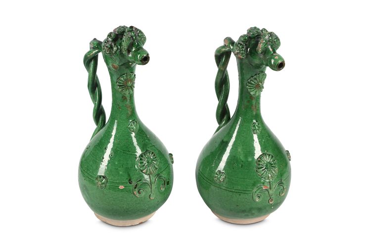 TWO LIGHT GREEN-GLAZED CANAKKALE POTTERY EWERS