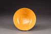 A CHINESE YELLOW GLAZED DRAGON BOWL,
