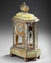 A FRENCH BRONZE AND CHAMPLEVÉ ENAMEL MANTEL CLOCK, 19TH  CENTURY