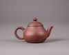 A Chinese yixing teapot and cover