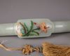 A Chinese hardstone-inlaid pale celadon jade ruyi sceptre