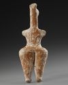 AN AMLASH TERRACOTTA STEATOPHYGOUS FIGURE, CIRCA EARLY 1ST MILLENIUM B.C.