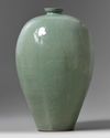 A large Korean celadon-glazed ‘dragon and phoenix’ maebyeong