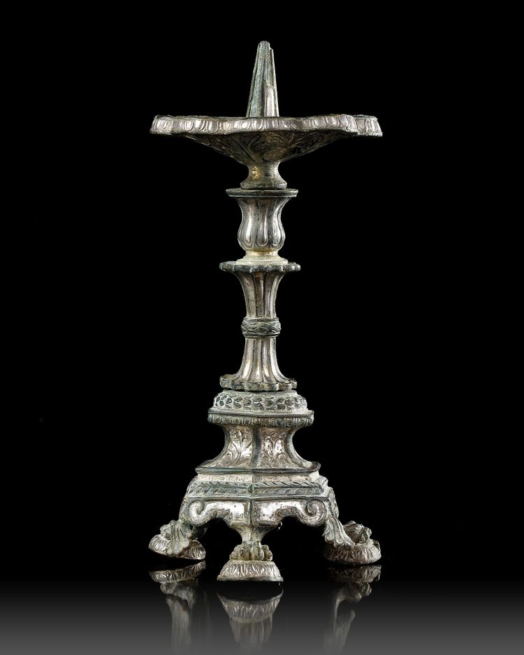 A BYZANTINE BRONZE CANDLESTICK, CIRCA 5TH-6TH CENTURY A.D.