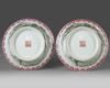 A pair of Chinese famille rose jardinieres and stands