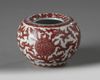 A Chinese underglaze copper-red and blue-decorated 'floral' washer, pingguo zun